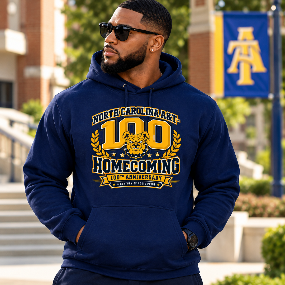 Man wearing a navy North Carolina A&T 100th Anniversary Homecoming hoodie