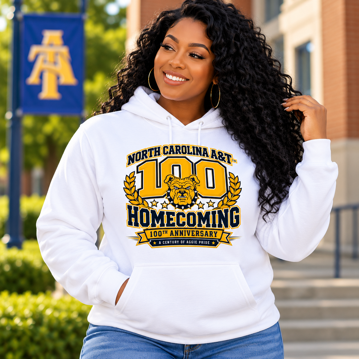 Woman wearing a white North Carolina A&T 100th Anniversary Homecoming hoodie