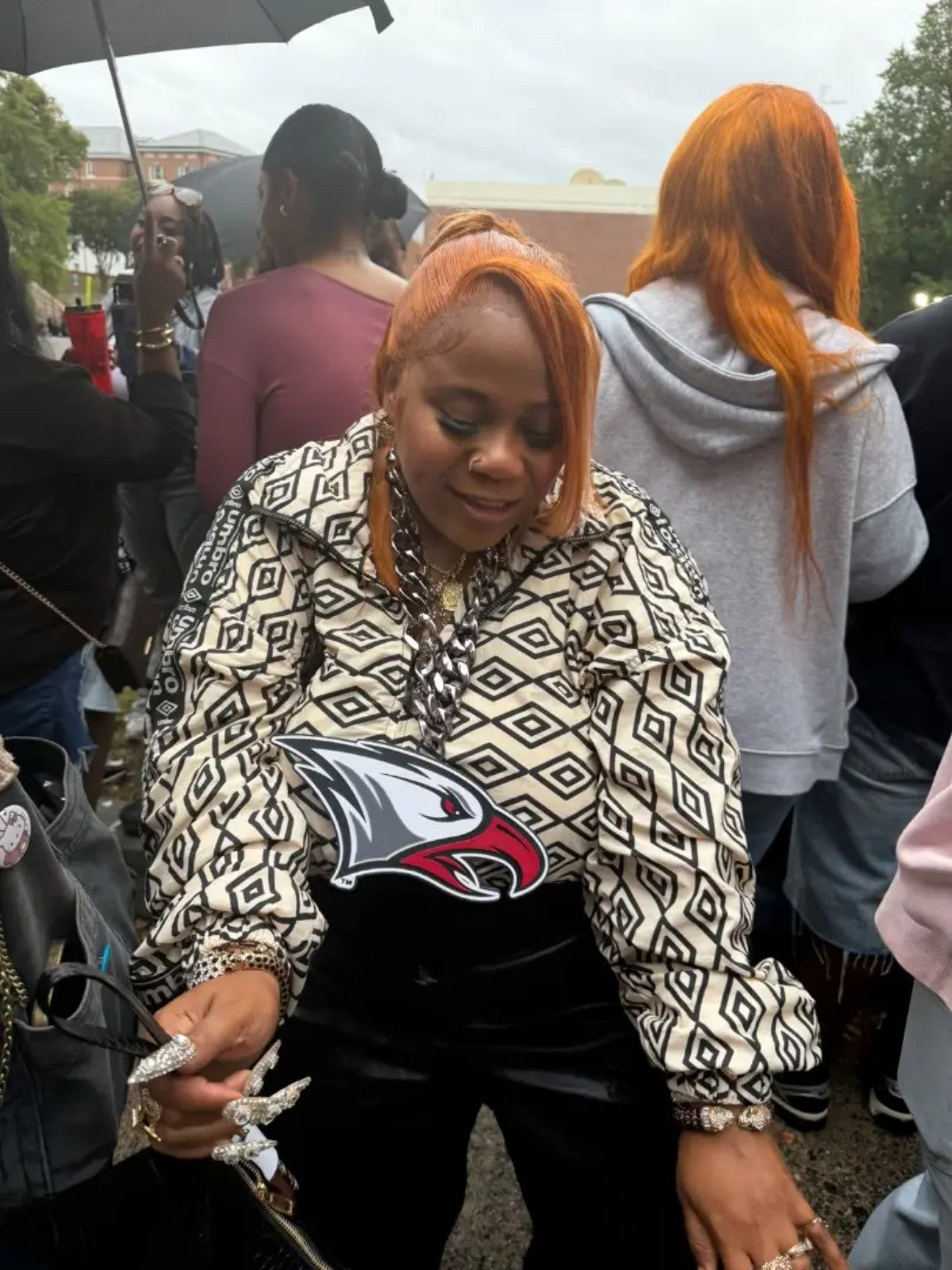 Fan wearing the NCCU Eagles Hype Chain at an outdoor event